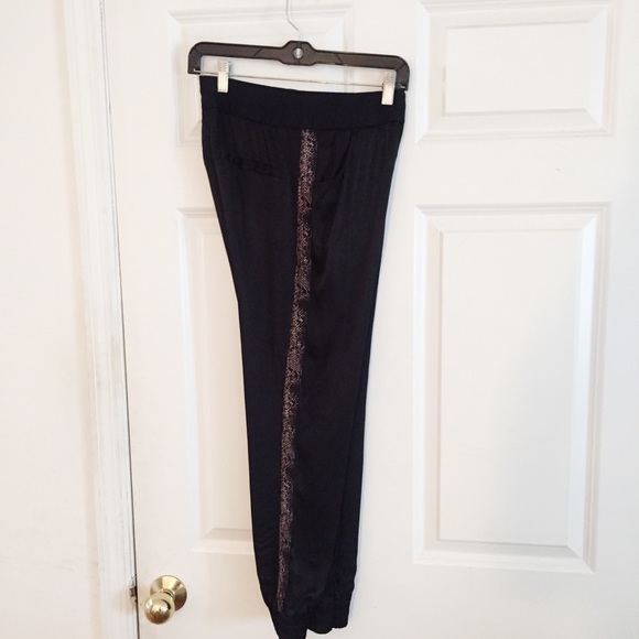 black trousers with leopard print stripe